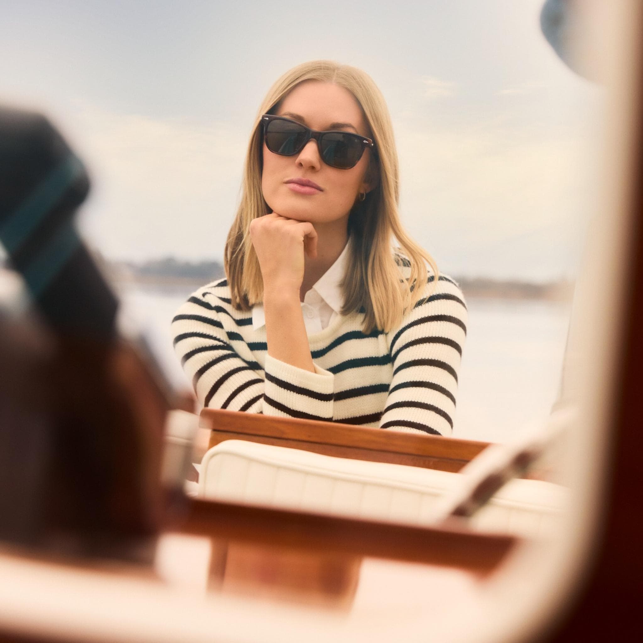 Woman wearing Saratoga sunglasses from AO Eyewear
